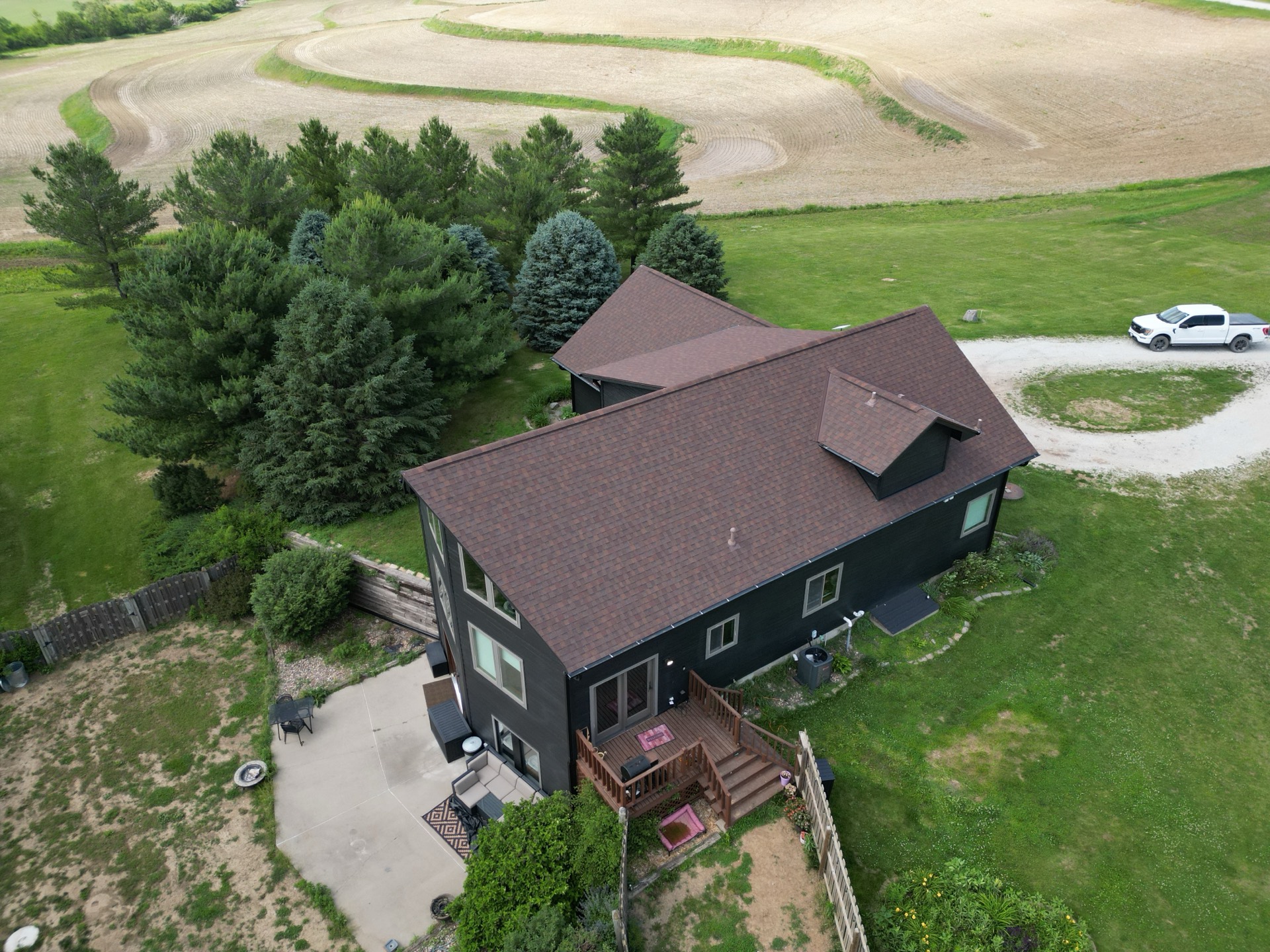 Aerial of a finished roof on a country property